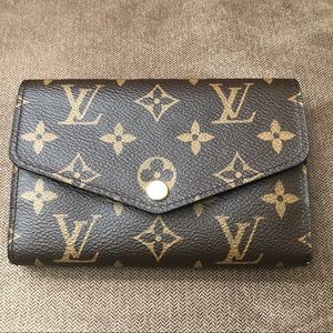 Authentic LV Sarah Compact wallet $400